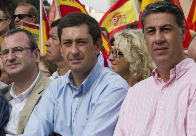 Alberto Villagrasa, a la izquierda y Xavier García Albiol, a la derecha