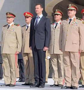 El-Asad, junto a su Gabinete. 