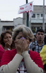 Seguidores de Chávez lloran su muerte en Caracas. 