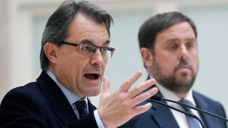 Artur Mas y al fondo el líder de ERC, Oriol Junqueras