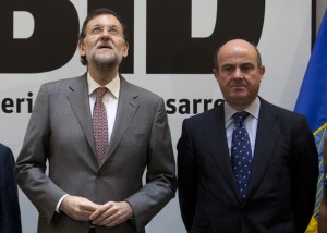 Mariano Rajoy y Luis de Guindos, el pasado julio, en un acto en Madrid. 
