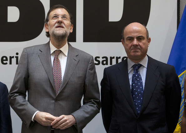 Mariano Rajoy y Luis de Guindos, el pasado julio, en un acto en Madrid.
