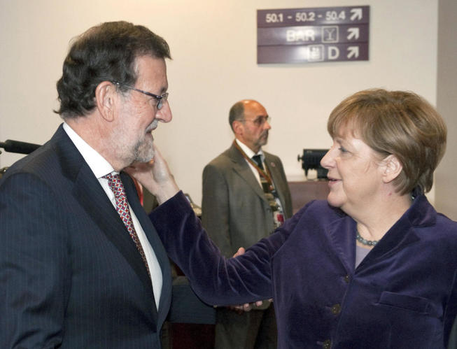 Rajoy y Merkel. 