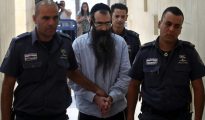 El judío ultraortodoxo Yishai Shlissel (c), condenado el 26 de junio de 2016 en una corte de Jerusalén