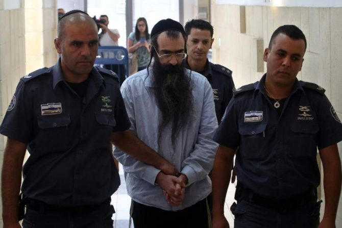 El judío ultraortodoxo Yishai Shlissel (c), condenado el 26 de junio de 2016 en una corte de Jerusalén