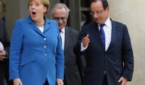 Merkel y Hollande.