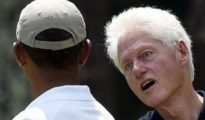 Bill Clinton, junto a Obama.