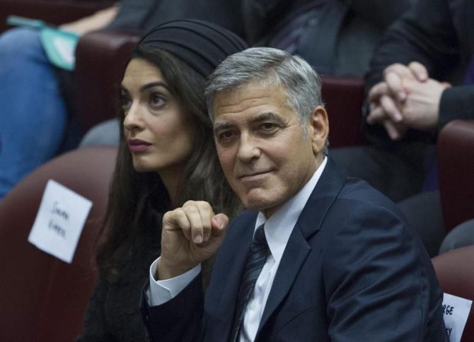 George Clooney y su mujer, Amal. 