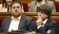 Puigdemont (d) y Oriol Junqueras