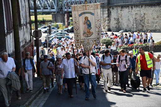 Católicos en Lourdes.