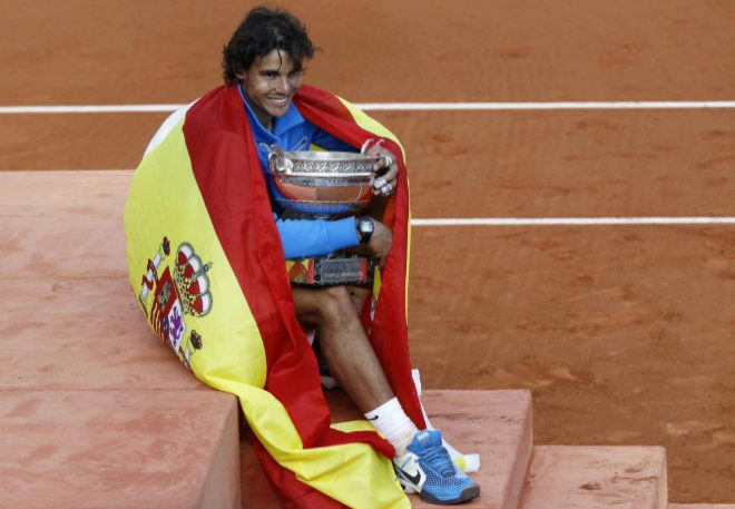 Con la bandera de España, Nadal no se separa de su quinto título (2011). 