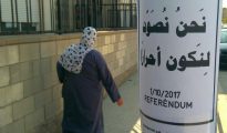 "Votemos para ser libres" en árabe, en Salt