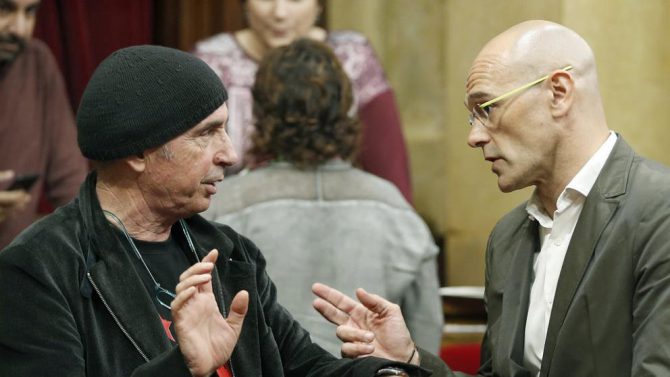 Llach i Grande y Raúl Romeva.