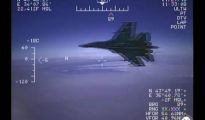 Imagenes captadas del caza ruso desde el avión de EE.UU.