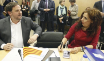 El exvicepresidente de la Generalitat, Oriol Junqueras, con la ministra de Hacienda, María Jesús Montero
