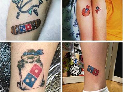 Tatuajes con el logo de Domino's Pizza.