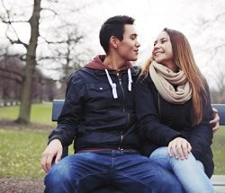 happy-teen-couple-look-at-one-another.jpg