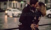 https://thumb10.shutterstock.com/display_pic_with_logo/3292109/675596407/stock-photo-stylish-gypsy-couple-in-love-kissing-in-evening-city-street-at-moving-car-lights-woman-and-man-675596407.jpg